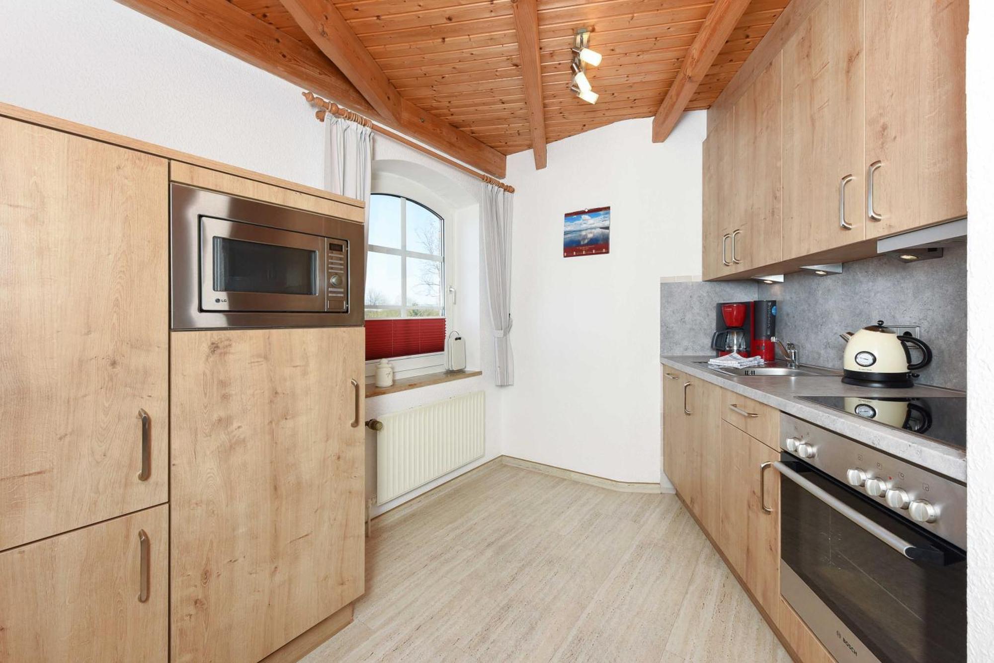 Ferienwohnungen im Gezeitenhaus Bensersiel Exterior foto